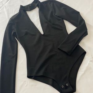 Low front, low back body suit